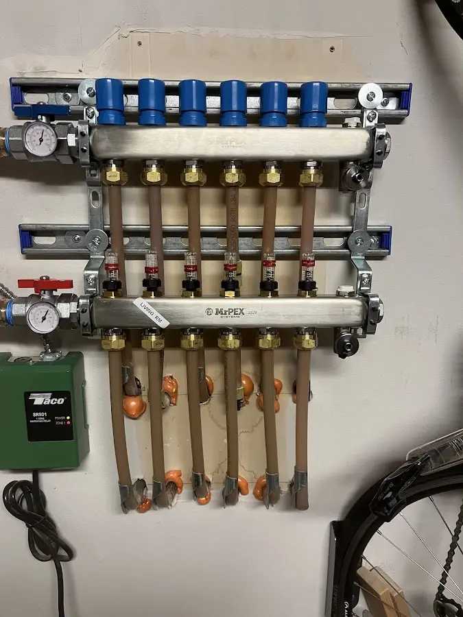 Plumber performing Gas Line Installation at a residential property in Alexandria